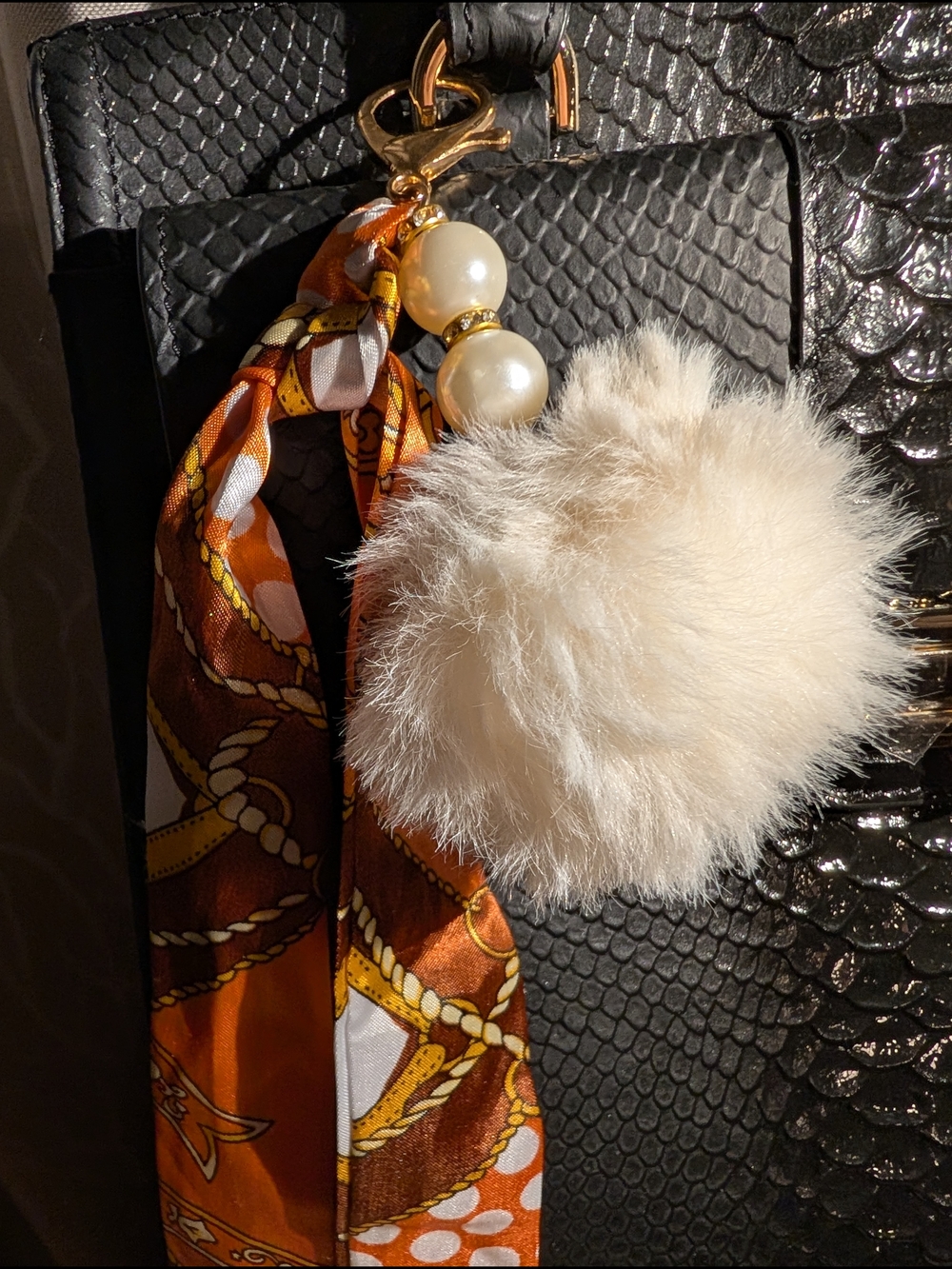 Faux Fur Pom Keychain with Pearl Beads and Orange Scarf Accent
